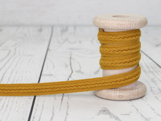 band-kordel-flachkordel-zopf-muster-ocker