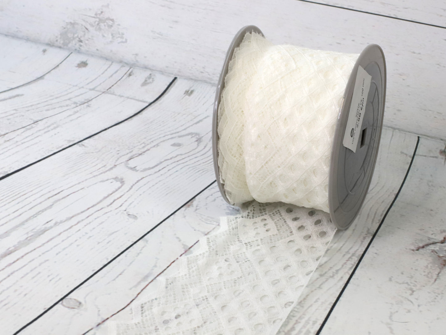 breite_spitze_polyester_100mm_wollweiss