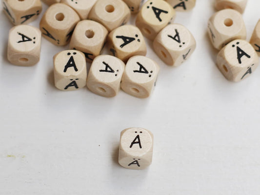 holz-schnulli-perle-fuer-schnullerketten-buchstabe-ae