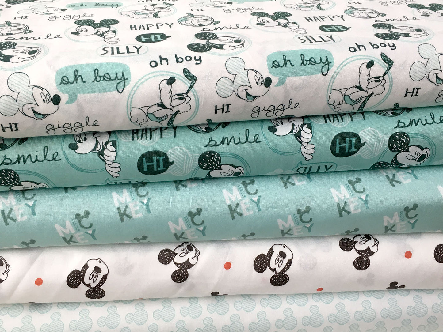 patchwork-baumwolle-stoff-mickey-mouse-lizenz-serie-petrol