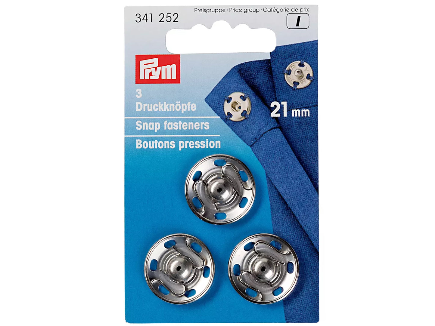 Prym Annäh-Druckknöpfe 21mm silber auf Verpackung mit blauer Stoffprobe.