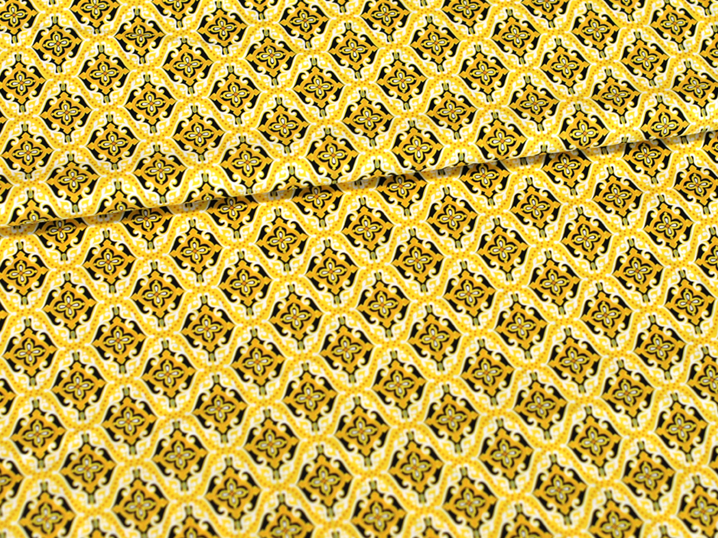 Patchworkstoff - Baumwolle Stoff - Sundace, gelb mit elegantem Muster in Gelbtönen, ideal für kreative Nähprojekte.