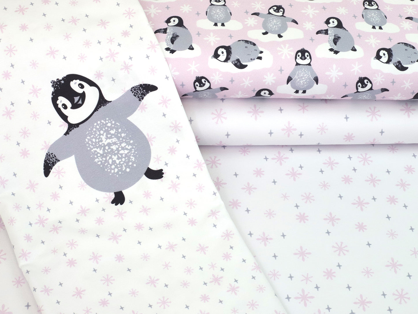 stoff-french-terry-sommersweat-sweat-baumwolle-pinguine-kombi-schneeflocken-rosa-panel