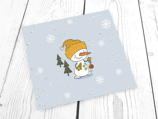 stoff-french-terry-sommersweat-sweat-unangeraut-baumwolle-kathi-kunterbunt-weihnachten-winter-schneemann-tannenbaum-schnee-schneeflocken-blaugrau-panel-schneemann-mit-baumschmuck