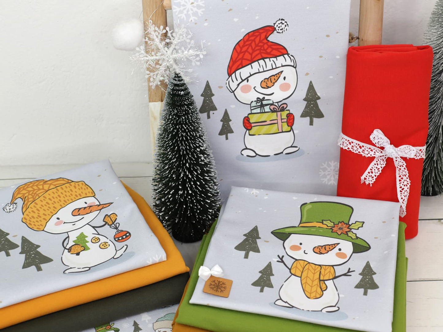 stoff-french-terry-sommersweat-sweat-unangeraut-baumwolle-kathi-kunterbunt-weihnachten-winter-schneemann-tannenbaum-schnee-schneeflocken-blaugrau-serie