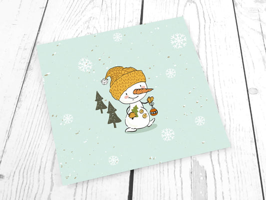 stoff-french-terry-sommersweat-sweat-unangeraut-baumwolle-kathi-kunterbunt-weihnachten-winter-schneemann-tannenbaum-schnee-schneeflocken-mint-panel-schneemann-mit-baumschmuck