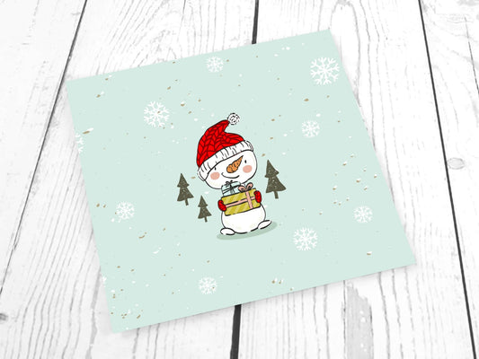 stoff-french-terry-sommersweat-sweat-unangeraut-baumwolle-kathi-kunterbunt-weihnachten-winter-schneemann-tannenbaum-schnee-schneeflocken-mint-panel-schneemann-mit-geschenk