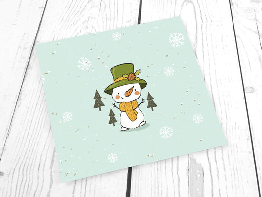 stoff-french-terry-sommersweat-sweat-unangeraut-baumwolle-kathi-kunterbunt-weihnachten-winter-schneemann-tannenbaum-schnee-schneeflocken-mint-panel-schneemann-mit-hut