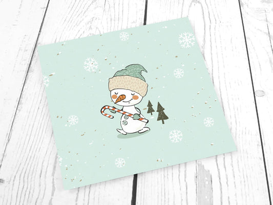 stoff-french-terry-sommersweat-sweat-unangeraut-baumwolle-kathi-kunterbunt-weihnachten-winter-schneemann-tannenbaum-schnee-schneeflocken-mint-panel-schneemann-mit-zuckerstange