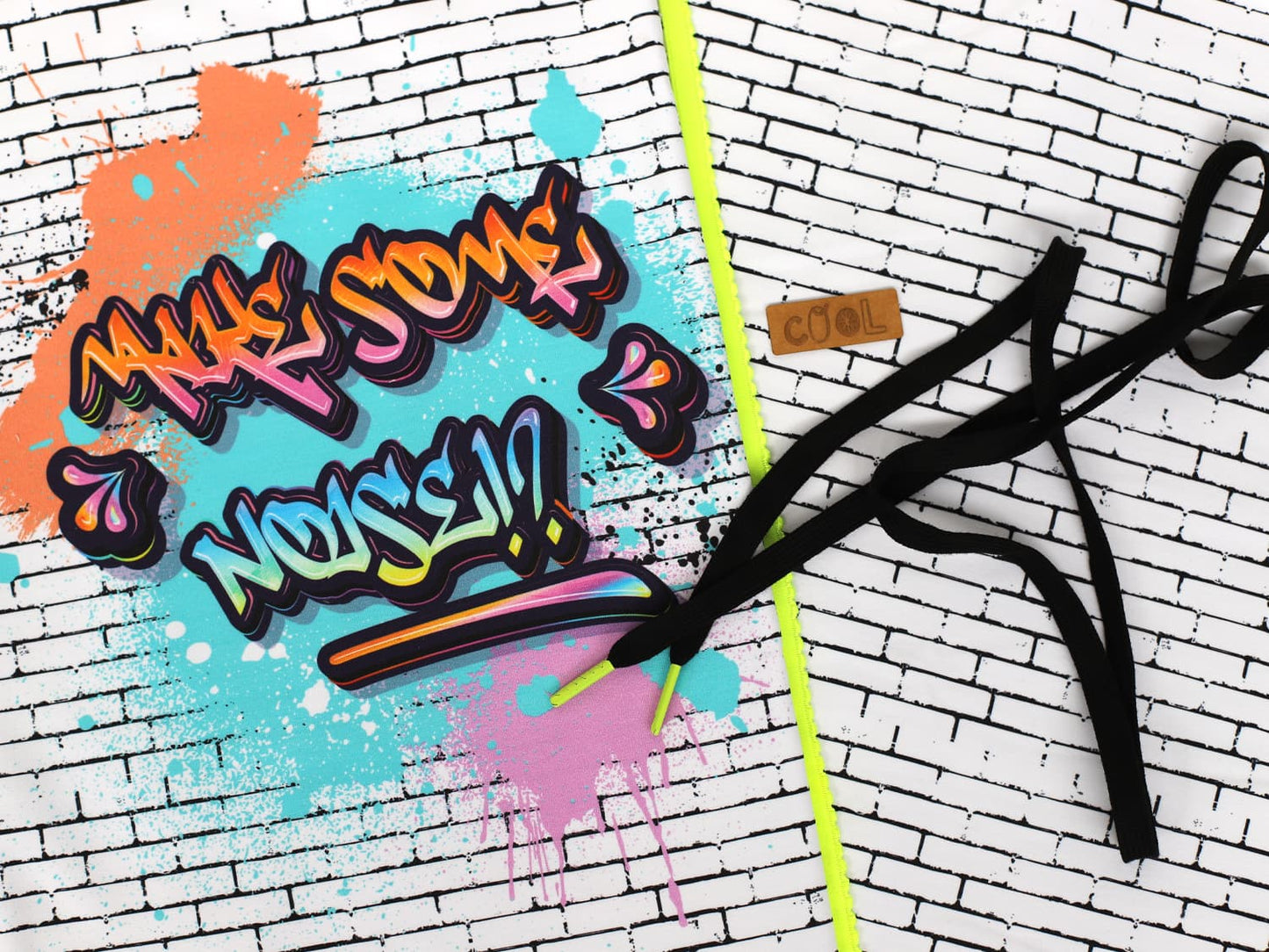 stoff-french-terry-sommersweat-unangeraut-make-some-noise-graffiti-schwarz-weiss-bunt
