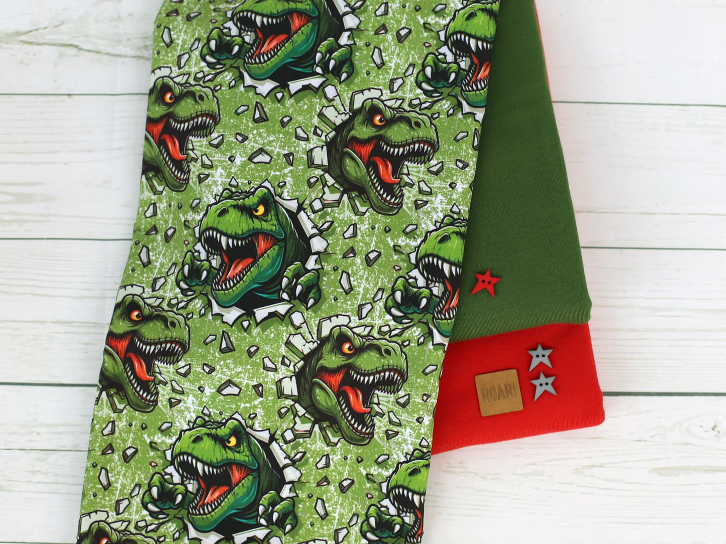 stoff-french-terry-sommersweat-unangeraut-t-rex-dino-dinosaurier-gruen-kombis
