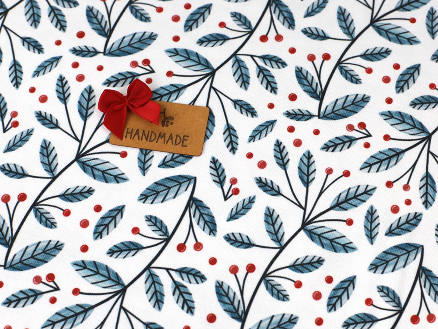 stoff-jersey-baumwolle-baumwolljersey-kathi-kunterbunt-winter-weihnachten-zweige-blaetter-und-beeren-petrolblau-bild