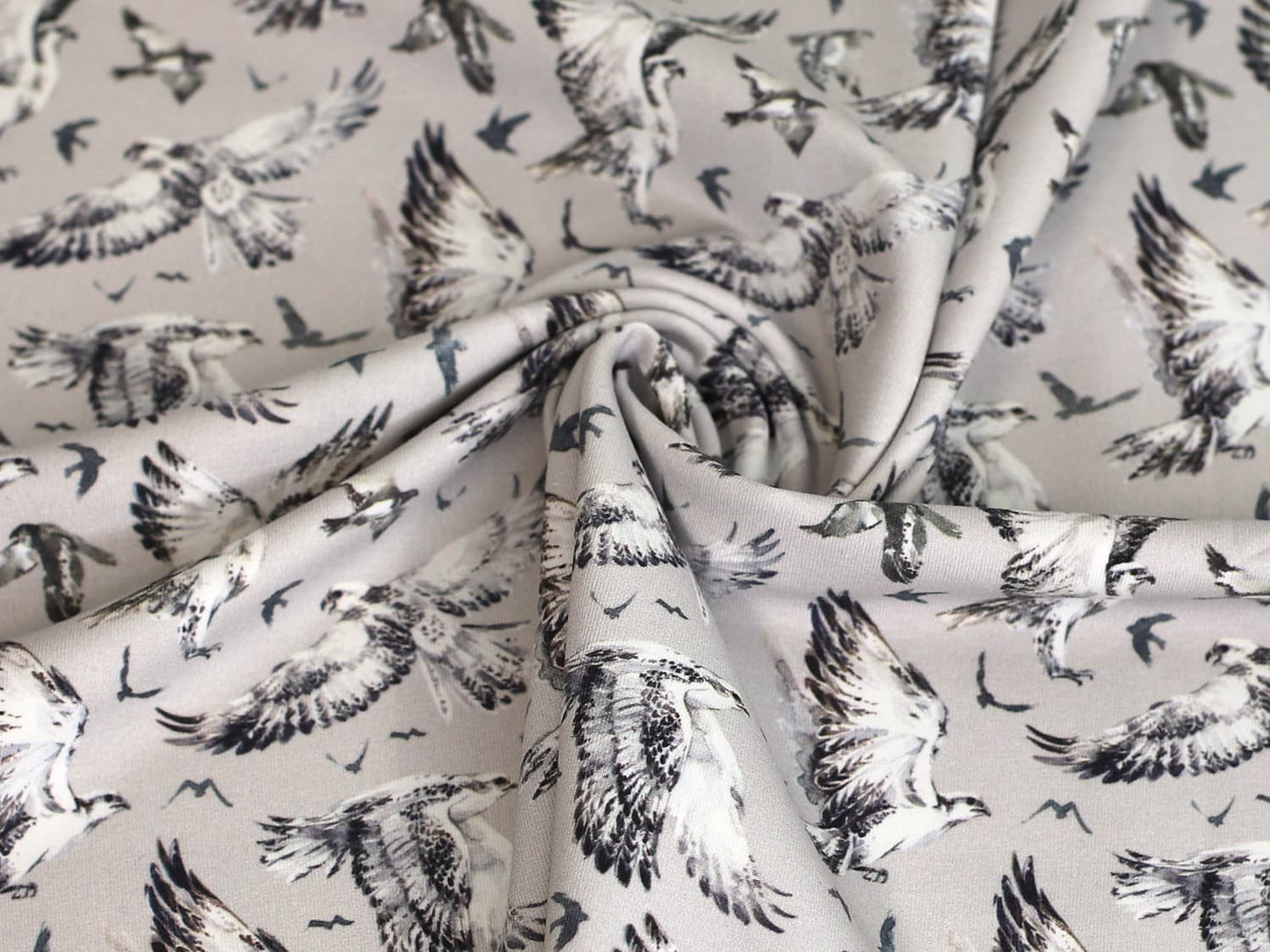 stoff-jersey-baumwolle-baumwolljersey-vogel-adler-grau-beige