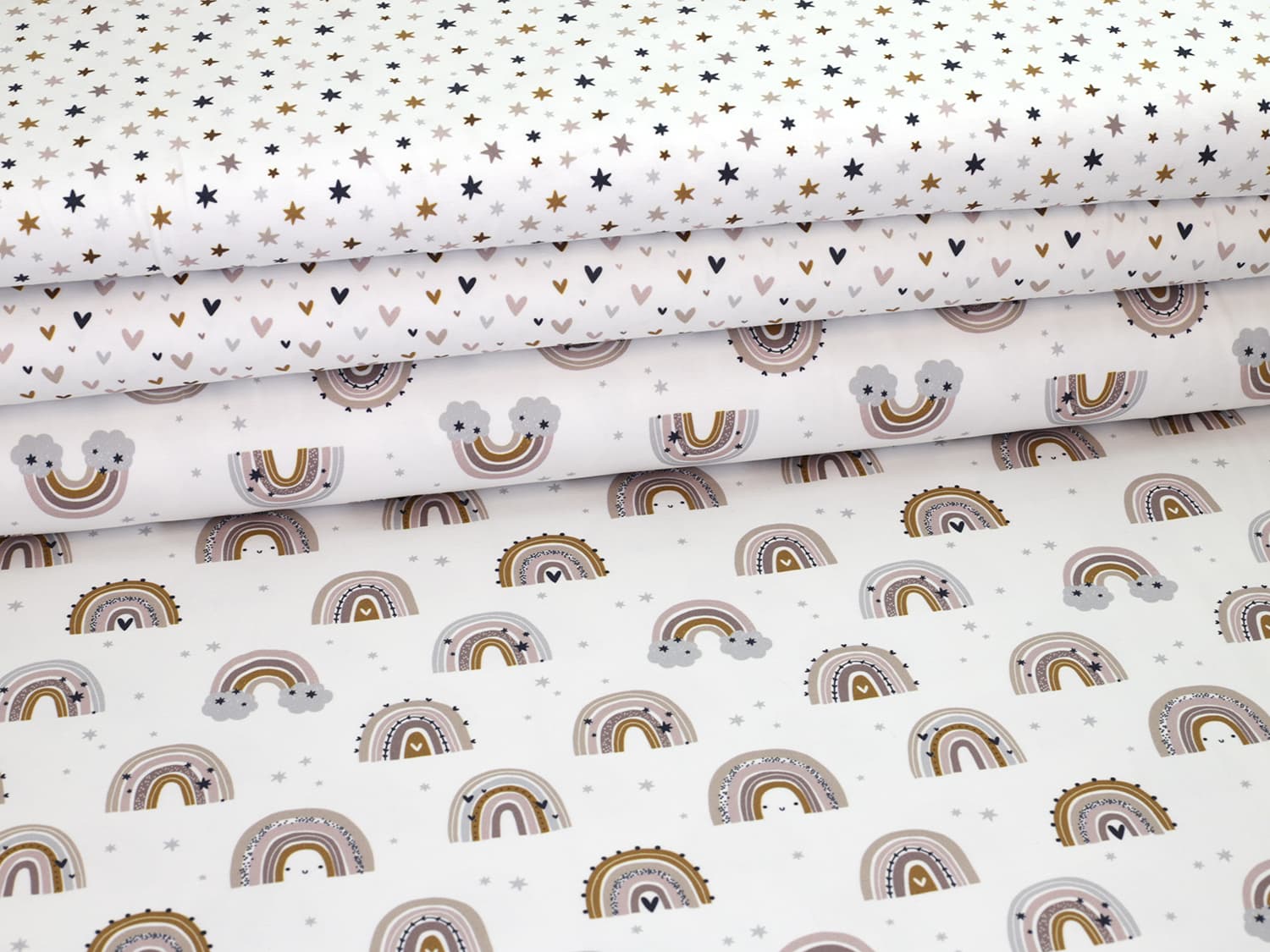 stoff-jersey-regenbogen-gesicht-smiley-herzen-tupfen-sterne-erdfarben-serie