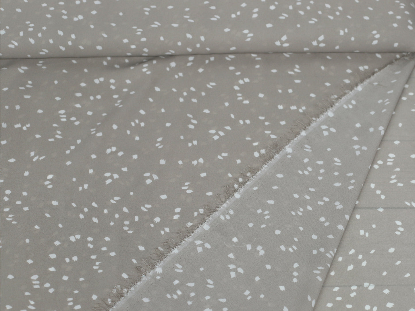 Bekleidungsstoff - Polyester - Flecken, graubeige