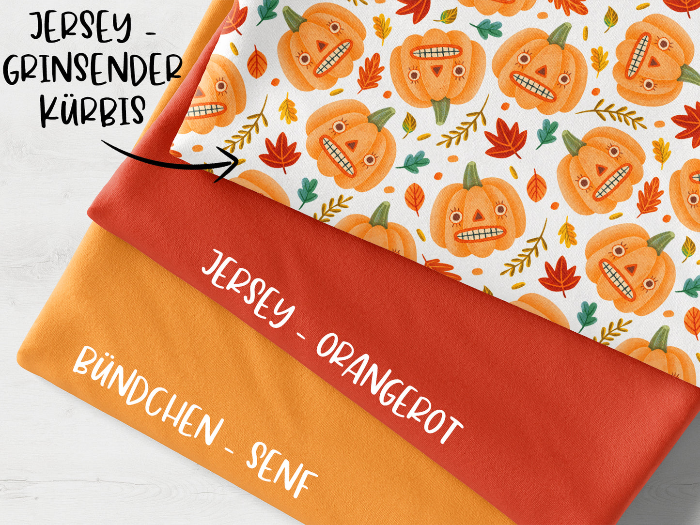 Stoffpaket mit Jersey - Grinsender Kürbis, orangerot und Bündchen - senf für kreative Projekte. grinsender kürbis stoffpaket senf