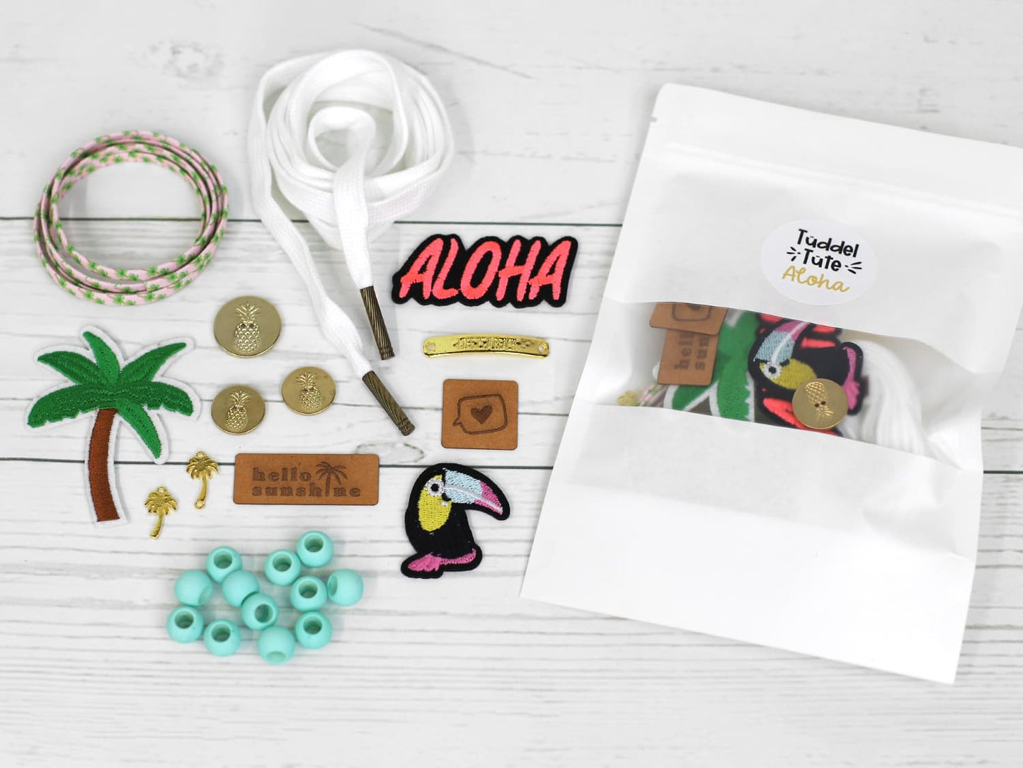 tueddel-tuede-Aloha-schleife-perlen-oesen-snappap-kordel