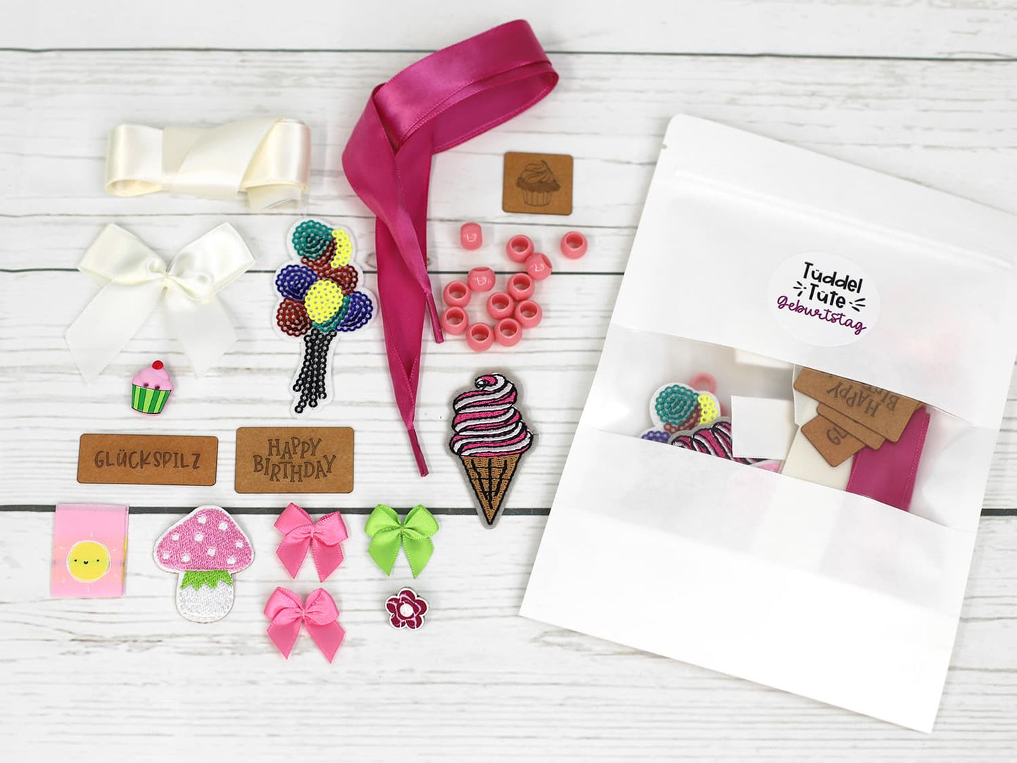 tueddel-tuede-geburtstag-schleife-perlen-oesen-snappap-kordel
