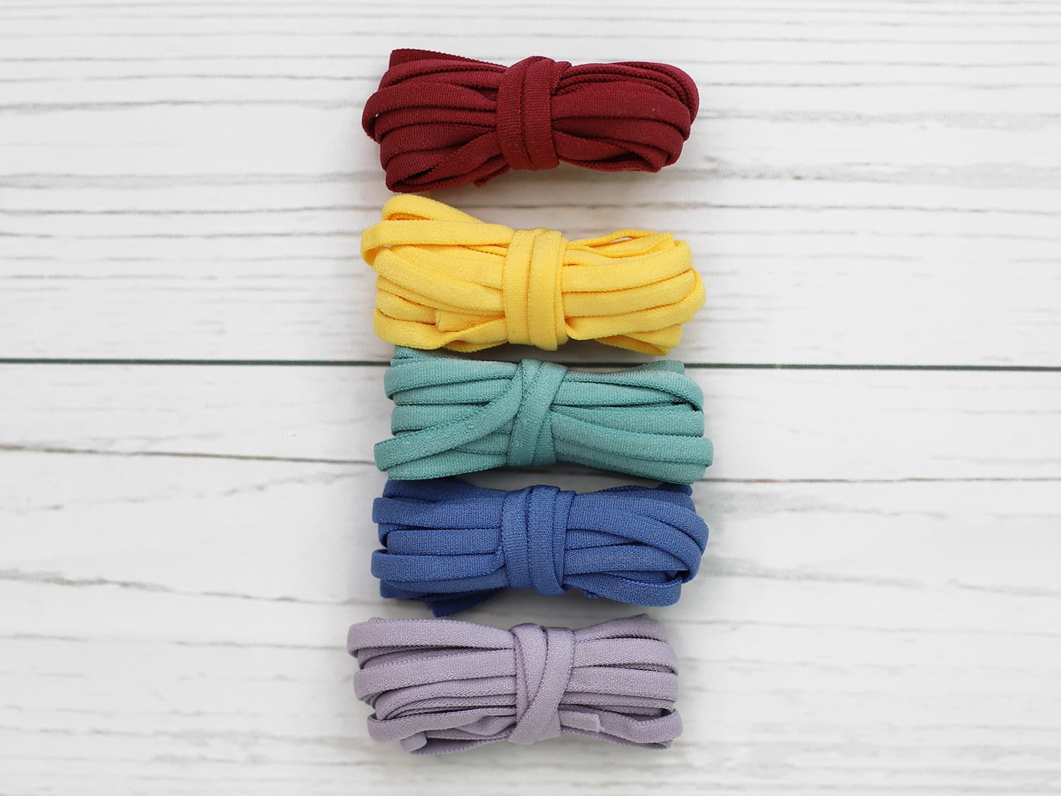 band-gummi-gummiband-mix-tuete-bordeaux-regenbogen-blau-gelb