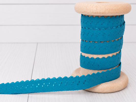 türkis elastisches einfassband auf Holzspule, schönes Design mit Bogenkante, 11 mm breit