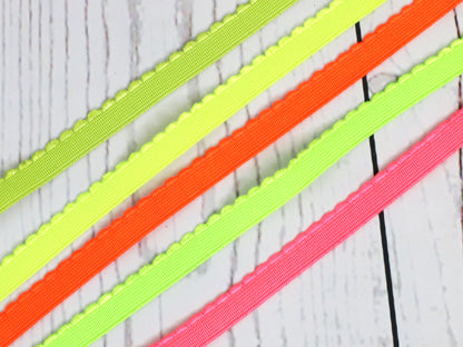 Neongelb Gummiband 12mm in verschiedenen Farben mit hübscher Bogenkante auf einer Seite, ca. 1,20m lang.