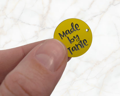 Sew-on label - made by Omi - black