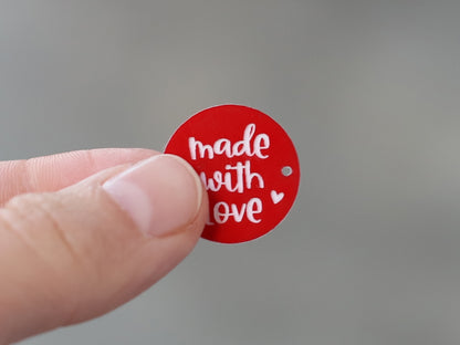 Sew-on label - made by Omi - black