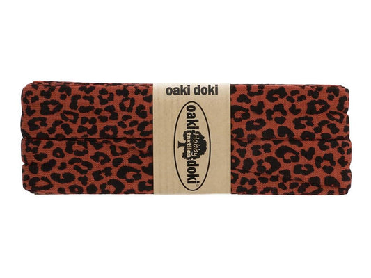 oaki-doki-schraegband-elastisch-viskose-leo-print-rostrot-schwarz-3007
