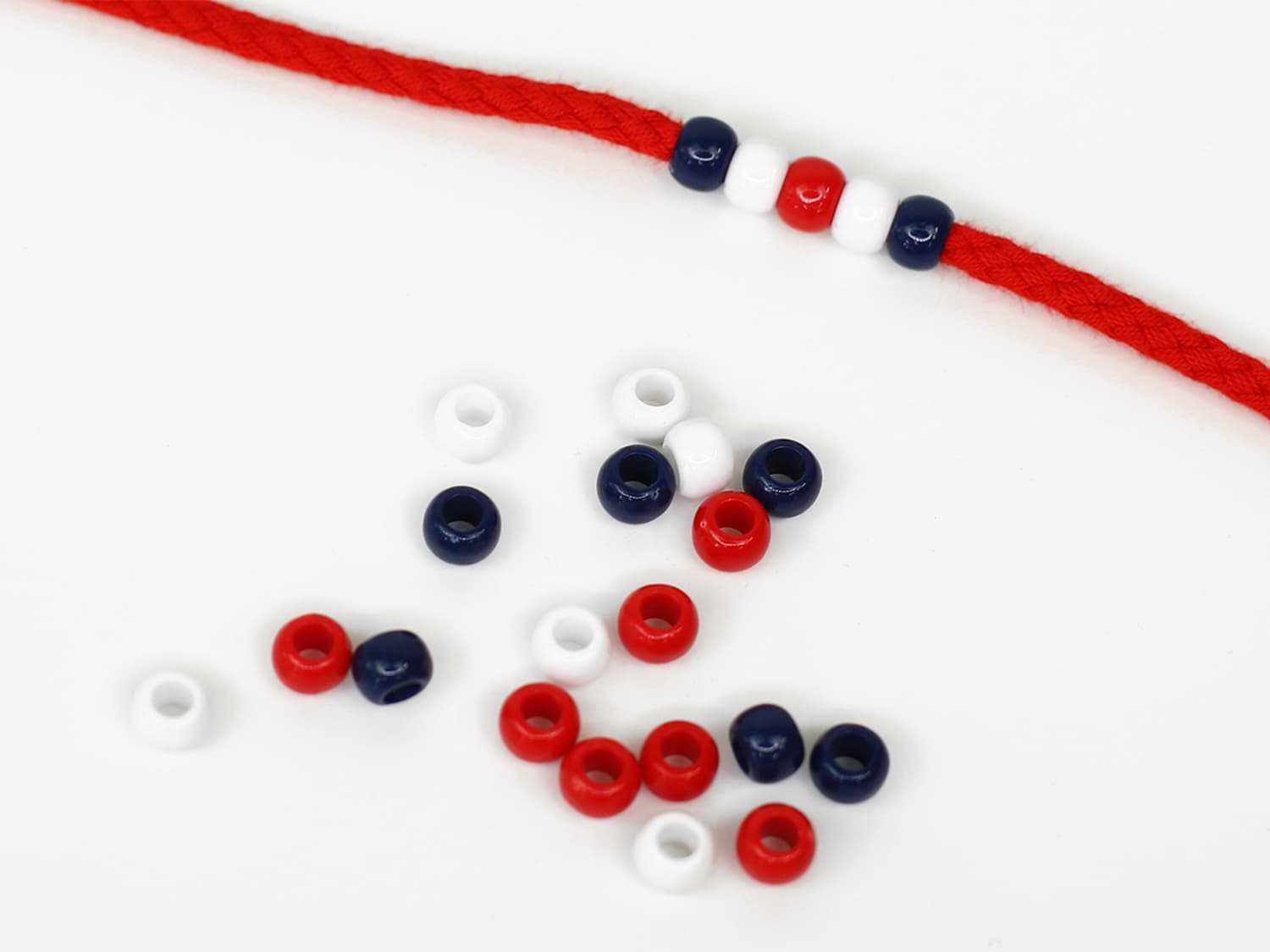 perlen-kordelperlen-kordel-6-8-mm-maritim-mix-rot-dunkelblau-weiss