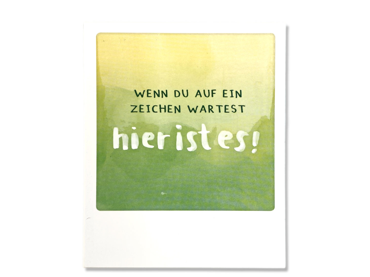 illustrative photo postcard featuring the text "Wenn du auf ein Zeichen wartest, hier ist es!" in green tones.