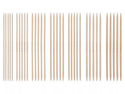 bamboo knitting needle set 2-4.5 mm displayed on a white background, showcasing various lengths and sizes.