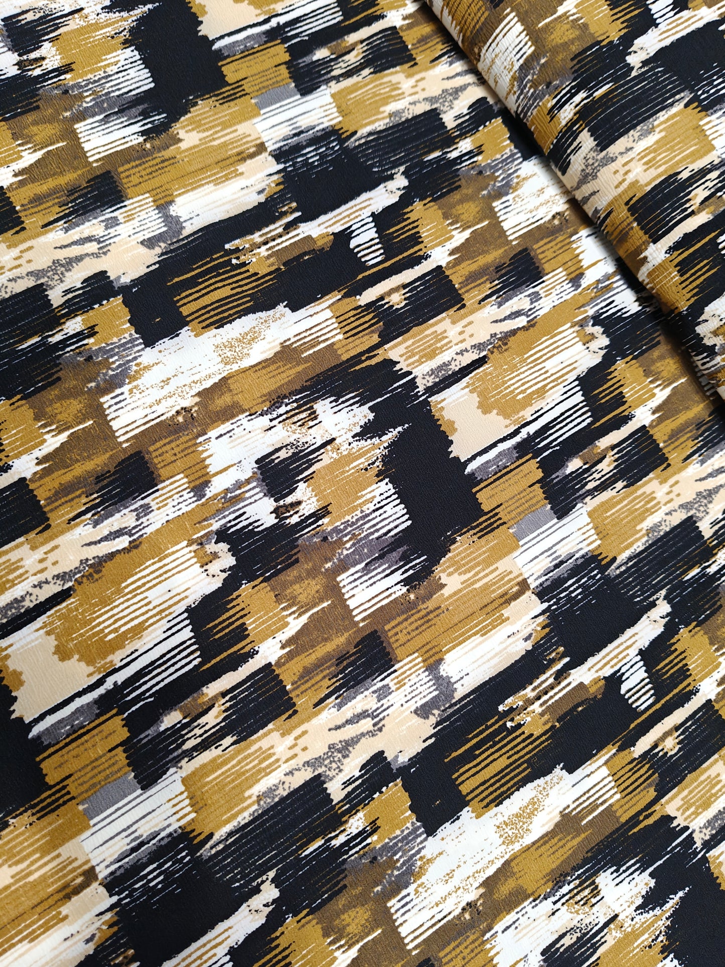 Polyester Jersey Stoff - Grafisch ocker schwarz