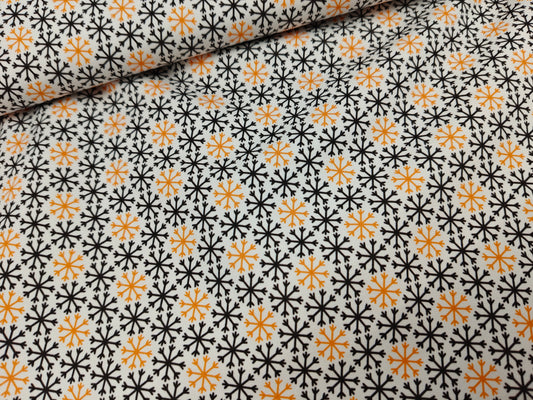 French Terry - Schneeflocken schwarz orange