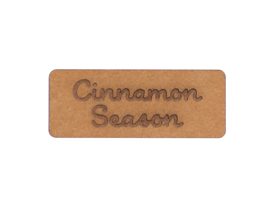 cinnamon snap pap label featuring the text 'Cinnamon Season' on a stylish leather-like material.