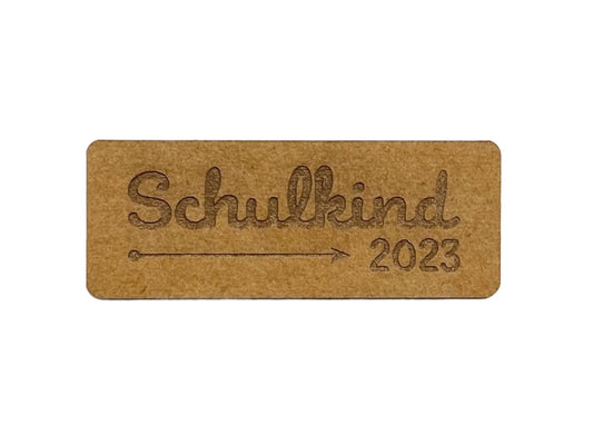 snappap-label-zum-annaehen-schulkind-pfeil-2023