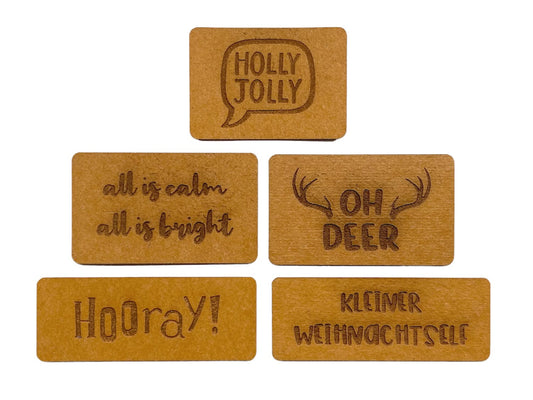 snappap-set-label-zum-annaehen-5-stueck-winter-weihnachten-holly-jolly-all-is-calm-all-is-bright-hooray-kleiner-weihnachtself-oh-deer-1