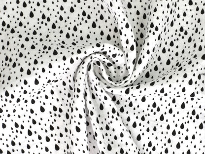 stoff-baumwolle-baumwollstoff-musselin-double-gauze-regen-tropfen-rain-wollweiss-schwarz