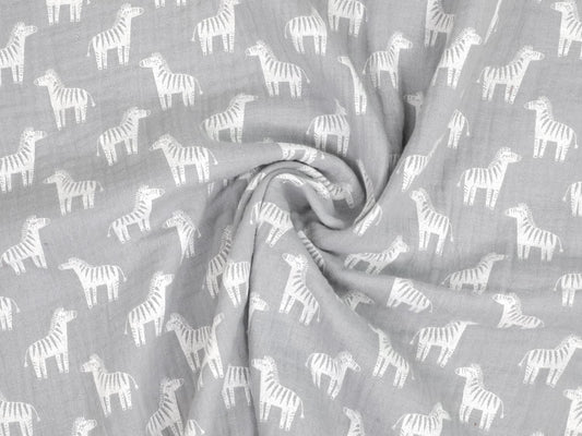 stoff-baumwolle-baumwollstoff-musselin-double-gauze-tier-zebra-hellgrau