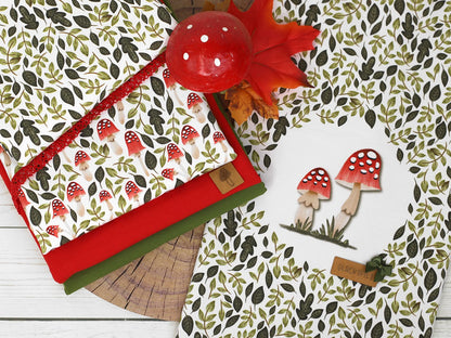 stoff-baumwolle-french-terry-sommersweat-kathi-kunterbunt-herbst-blaetter-laub-pilze-fliegenpilz-gruen-rot-panel-serie