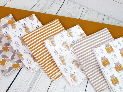 stoff-baumwolle-jersey-baumwolljersey-im-wald-ocker-beige-ocker-uni