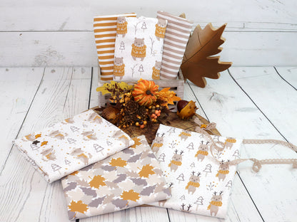 stoff-baumwolle-jersey-baumwolljersey-im-wald-ocker-beige-serie