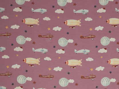 stoff-baumwolle-jersey-baumwolljersey-waffel-waffeljersey-swafing-maja-ueber-den-wolken-flugzeug-altrosa