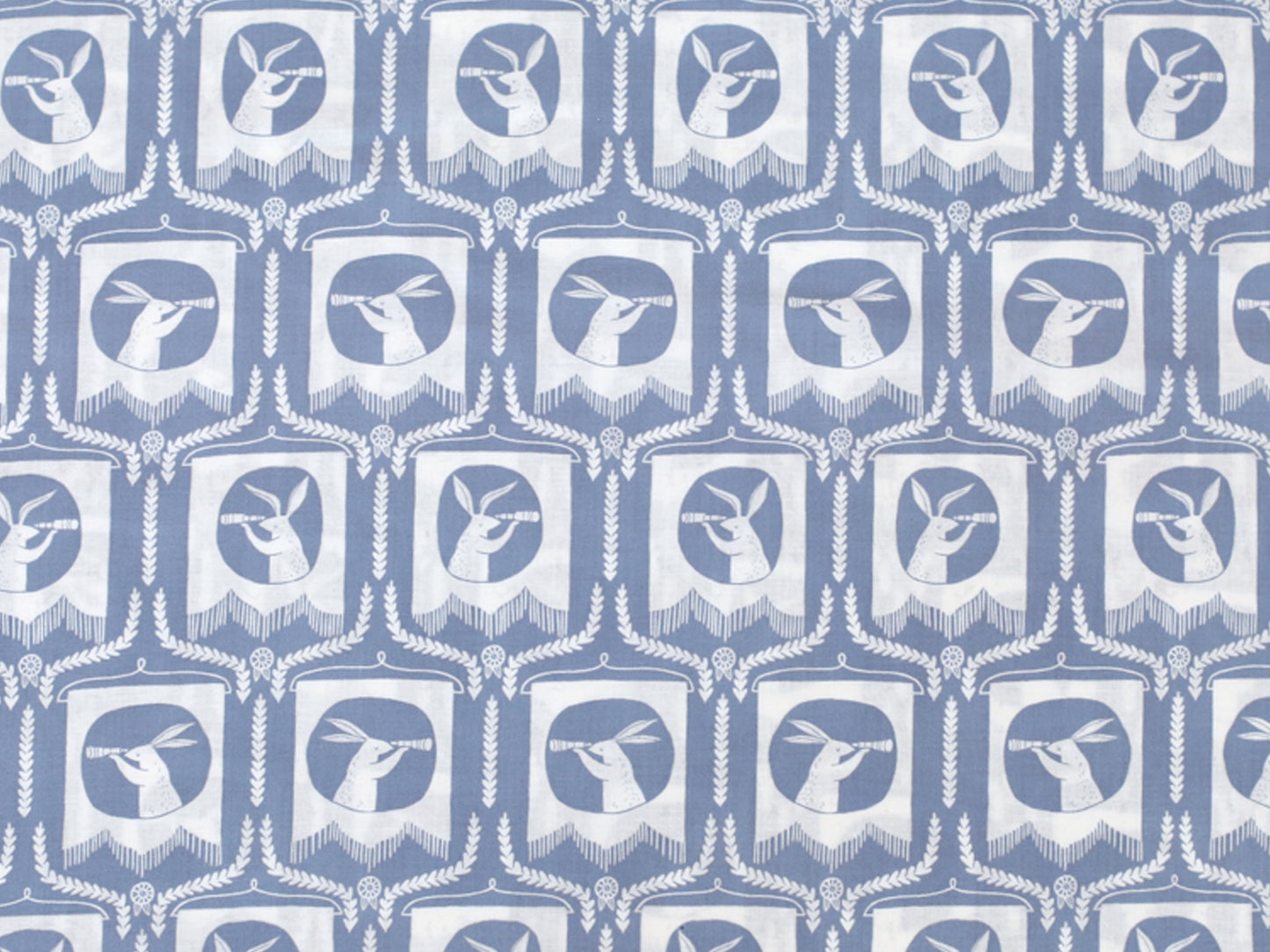 Patchworkstoff - Baumwolle Stoff - Blue Bunnies design in blue with white bunny motifs, ideal for crafting and sewing projects.