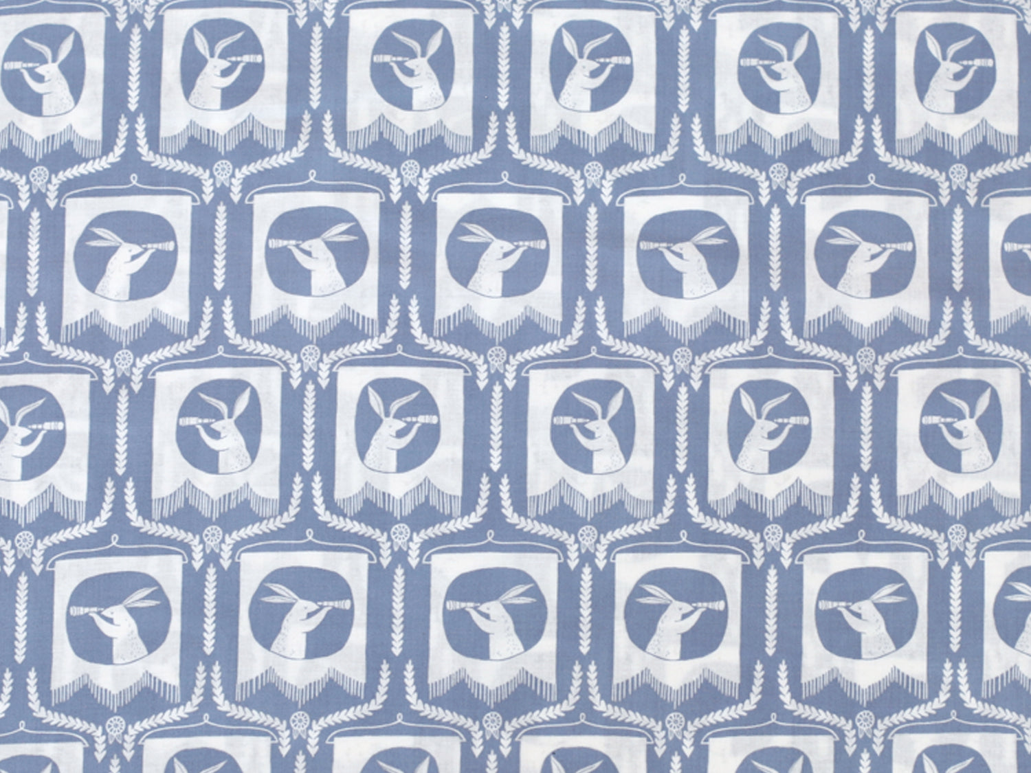 Patchworkstoff - Baumwolle Stoff - Blue Bunnies design in blue with white bunny motifs, ideal for crafting and sewing projects.