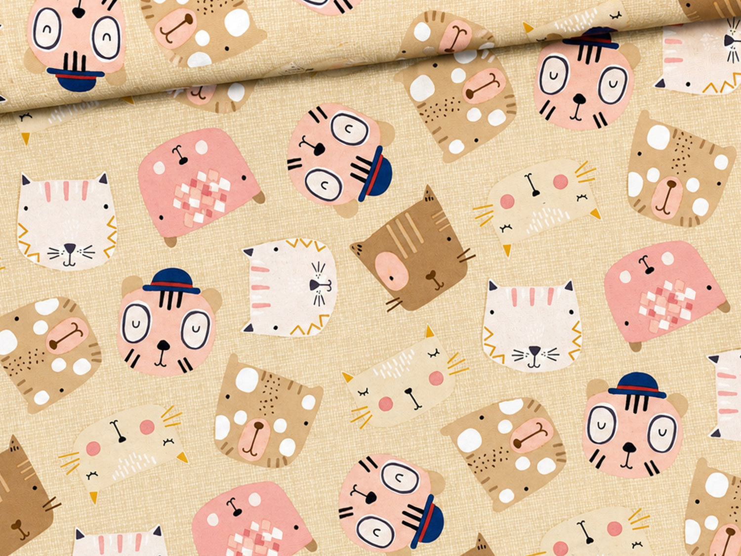 beige patchwork cotton fabric featuring playful animal faces on a light background.