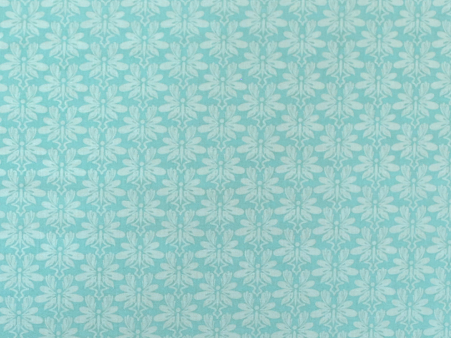 Patchworkstoff - Baumwolle Stoff - Mod About You in mintgrüner Blumenmuster-Design.