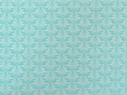 Patchworkstoff - Baumwolle Stoff - Mod About You in mintgrüner Blumenmuster-Design.