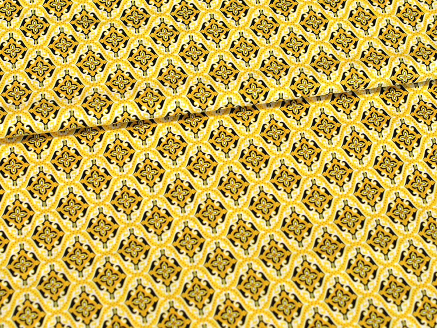 Patchworkstoff - Baumwolle Stoff - Sundace, gelb mit elegantem Muster in Gelbtönen, ideal für kreative Nähprojekte.