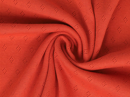 stoff-baumwolle-pointelle-einfarbig-uni-orangerot