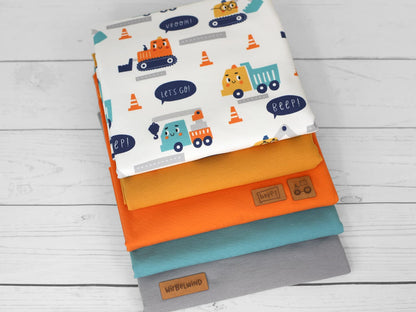 stoff-french-terry-baumwolle-sommersweat-unangeraut-kathi-kunterbunt-baufahrzeuge-mit-gesicht-beep-kombistoffe